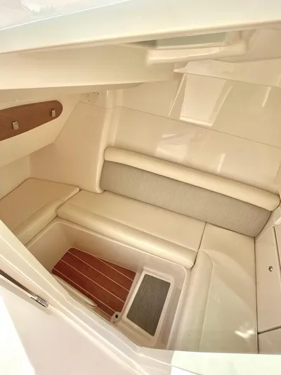  Yacht Photos Pics 2025 Grady-White Freedom 325 interior cabin with seating and storage.