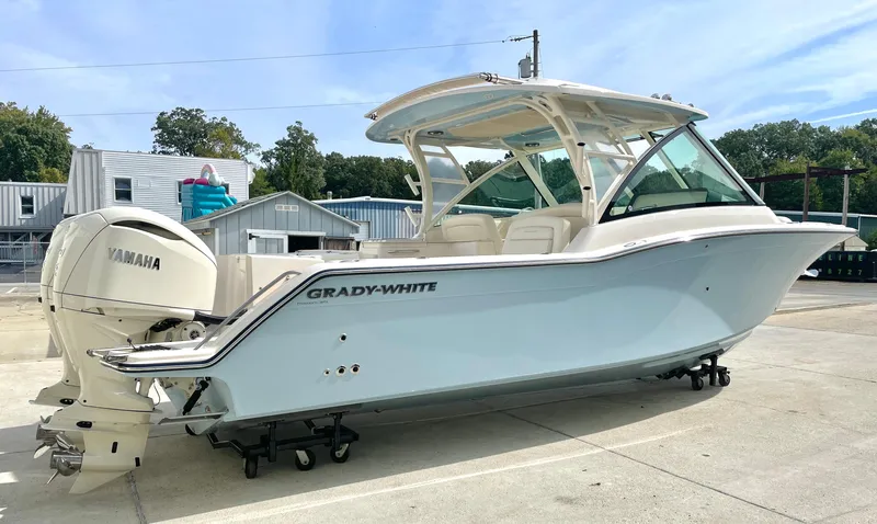  Yacht Photos Pics 2025 Grady-White Freedom 325 boat with Yamaha engines on display outdoors.