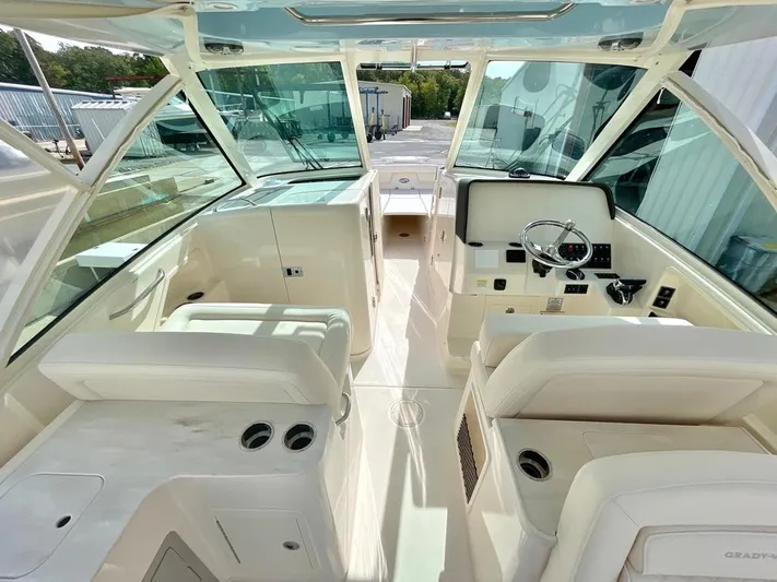  Yacht Photos Pics Interior of 2025 Grady-White Freedom 325 boat with modern helm and seating.
