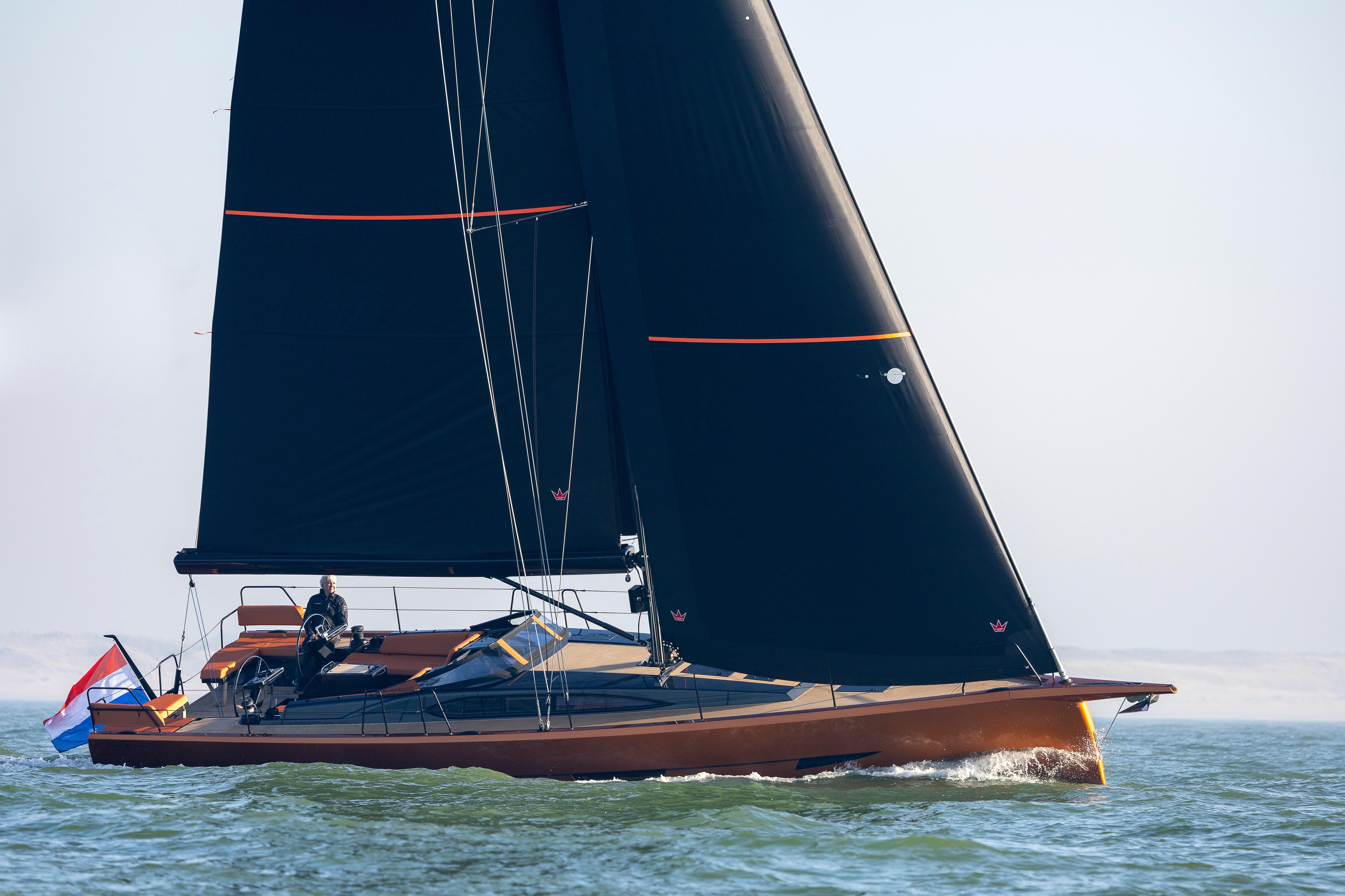 2027 Saffier SL 46 MED sailing yacht with sleek black sails on open water.