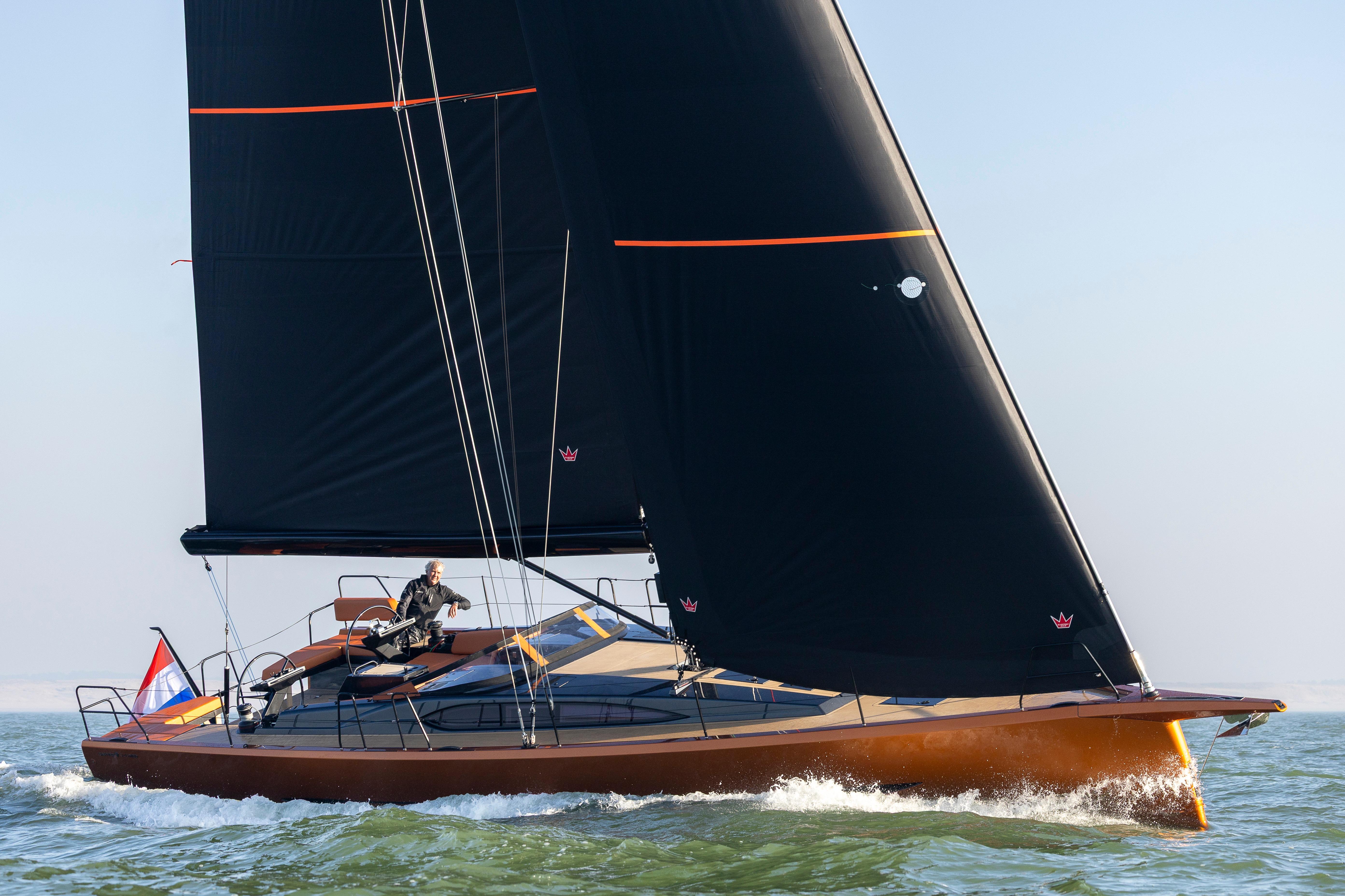 Saffier SL 46 MED 2027 sailing yacht with sleek black sails on open water.