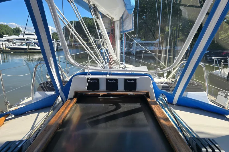 Sail Fourth Yacht Photos Pics Cockpit view of 2001 Tartan 3700 sailboat docked at marina.