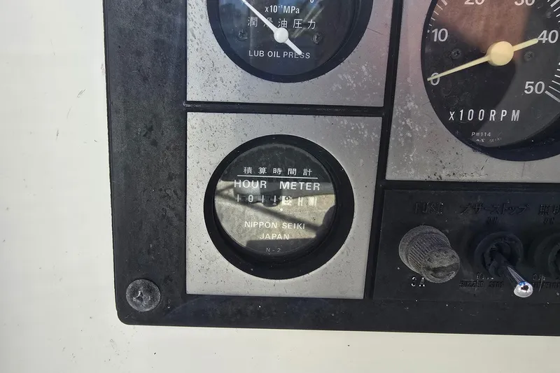 Sail Fourth Yacht Photos Pics Control panel of a 2001 Tartan 3700 with hour meter and RPM gauge.