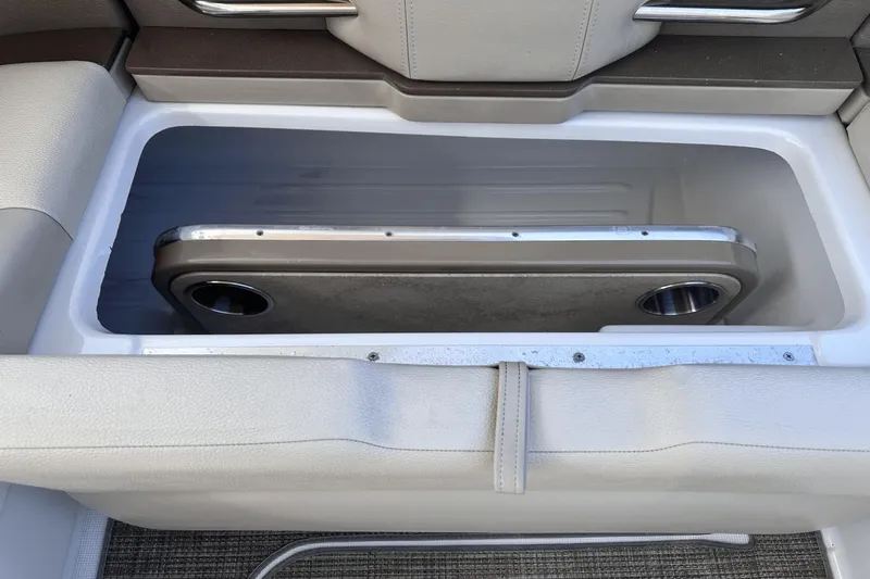  Yacht Photos Pics 2015 Formula 310 Bowrider storage compartment with table insert and cup holders.