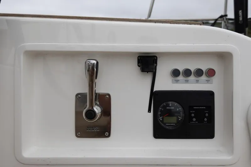 *previous Name Reserved Yacht Photos Pics Control panel of a 2019 Nautor Swan 48 yacht with throttle and gauges.