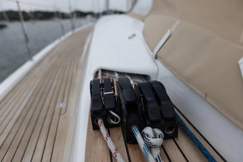 *previous Name Reserved Yacht Photos Pics Nautor Swan 48 yacht deck with rope clutches, 2019 model, teak finish.