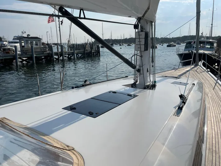 *previous Name Reserved Yacht Photos Pics Sleek 2019 Nautor Swan 48 yacht docked at marina, showcasing elegant deck design.
