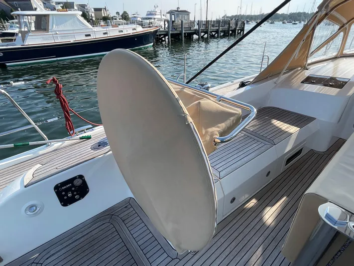 *previous Name Reserved Yacht Photos Pics Nautor Swan 48 yacht deck, 2019 model, docked at marina with elegant seating and controls.