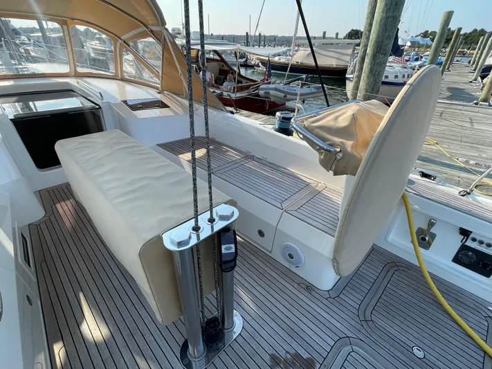 *previous Name Reserved Yacht Photos Pics Luxurious 2019 Nautor Swan 48 yacht cockpit with teak decking and beige seating.