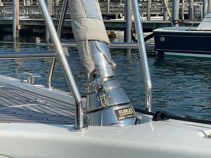 *previous Name Reserved Yacht Photos Pics Nautor Swan 48 sailboat deck detail, featuring a Furlex system, docked in a marina.