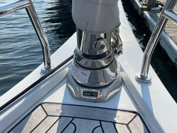 *previous Name Reserved Yacht Photos Pics Nautor Swan 48 yacht deck detail, showcasing polished metal fittings, 2019 model.