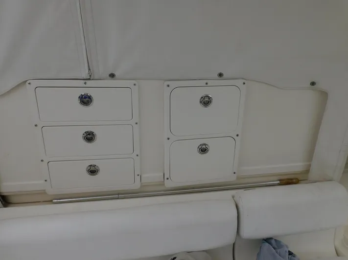 Mad Hatter Yacht Photos Pics Interior storage compartments on a 1997 Tiara Yachts Open model.