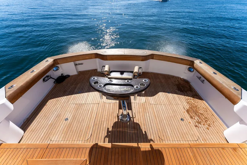 Chupacabra Yacht Photos Pics 2007 Hatteras 64 Convertible yacht deck with fishing chair.