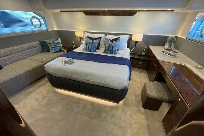 In Stock Yacht Photos Pics Luxurious 2024 Fairline Squadron 58 yacht bedroom with elegant decor and modern furnishings.