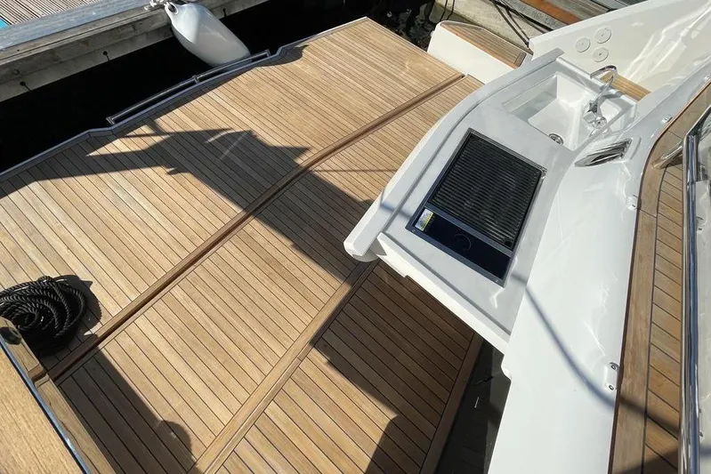In Stock Yacht Photos Pics Luxury Fairline Squadron 58 yacht deck with wood finish, 2024 model.