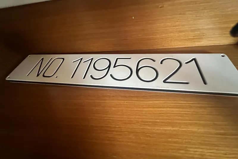  Yacht Photos Pics Plaque displaying "No. 1195621" on Jeanneau Sun Odyssey 42 DS, 2007 model.