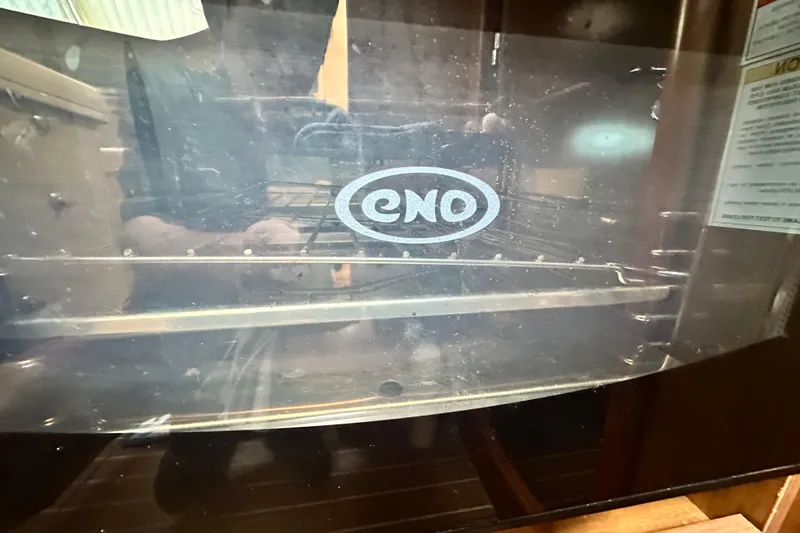  Yacht Photos Pics Oven inside Jeanneau Sun Odyssey 42 DS yacht, 2007 model, featuring ENO branding.