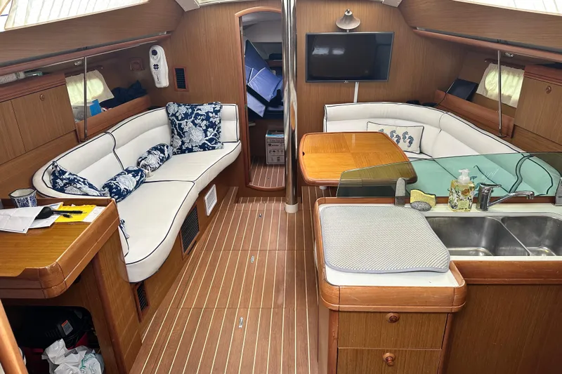 Yacht Photos Pics Interior of 2007 Jeanneau Sun Odyssey 42 DS yacht with elegant seating and modern amenities.