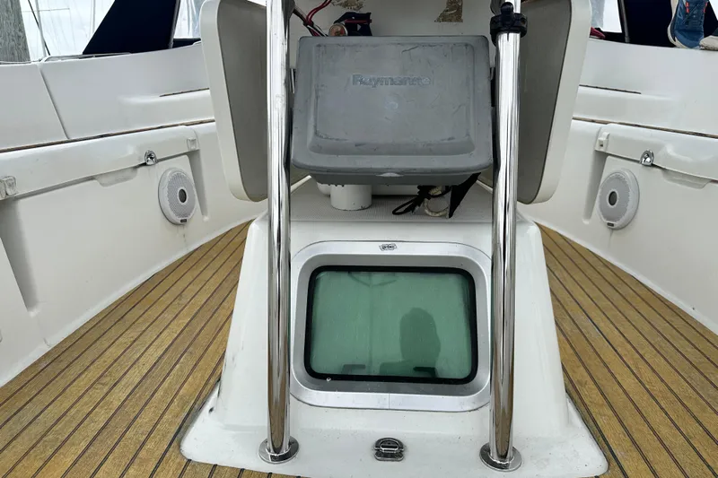  Yacht Photos Pics 2007 Jeanneau Sun Odyssey 42 DS cockpit with Raymarine equipment and teak flooring.