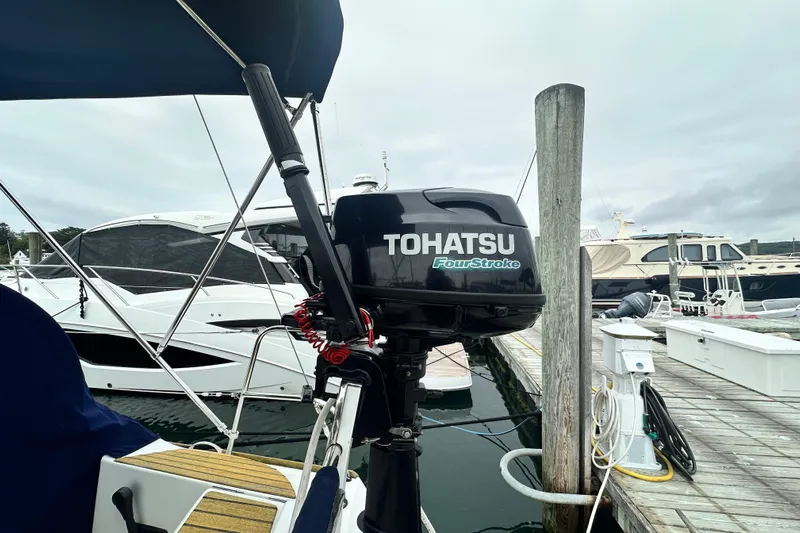  Yacht Photos Pics Tohatsu FourStroke outboard motor on Jeanneau Sun Odyssey 42 DS, 2007, docked at marina.