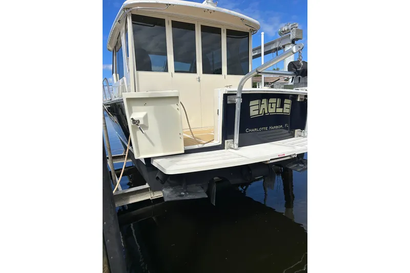 Eagle Yacht Photos Pics 2008 Mainship Pilot 34 boat docked at Charlotte Harbor, Florida.