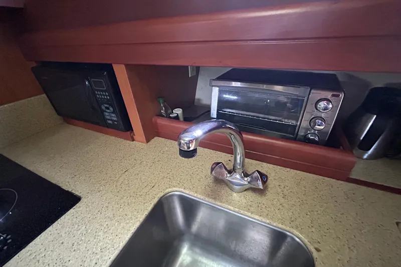 Eagle Yacht Photos Pics 2008 Mainship Pilot 34 galley with sink, microwave, and toaster oven.