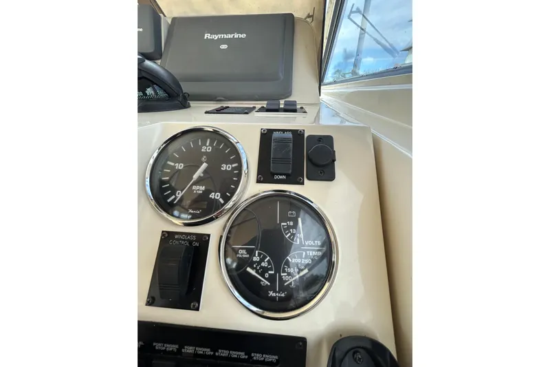 Eagle Yacht Photos Pics 2008 Mainship Pilot 34 dashboard with gauges and Raymarine navigation system.