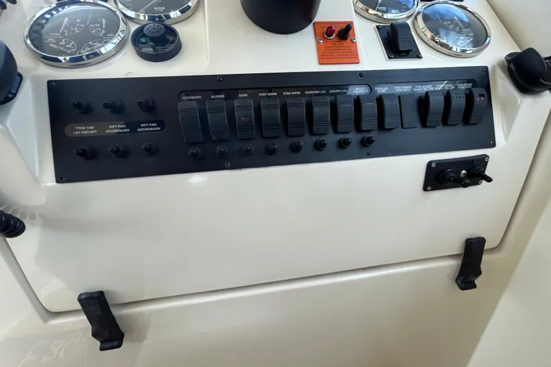 Eagle Yacht Photos Pics Control panel of a 2008 Mainship Pilot 34 boat with switches and gauges.