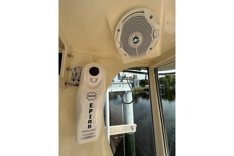 Eagle Yacht Photos Pics 2008 Mainship Pilot 34 interior with EPIRB and speaker, dockside view.