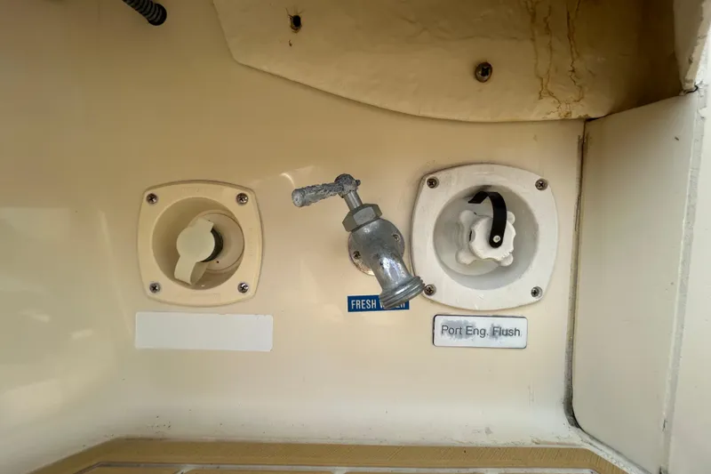 Eagle Yacht Photos Pics 2008 Mainship Pilot 34 boat fittings, including fresh water and port engine flush connections.