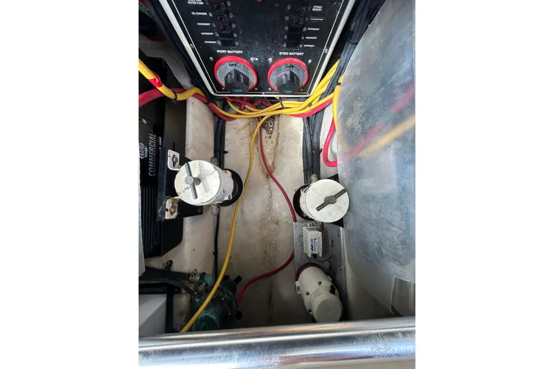 Eagle Yacht Photos Pics Engine compartment of a 2008 Mainship Pilot 34 with wiring and battery switches.