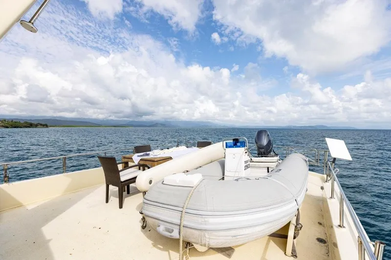 Seabear Yacht Photos Pics Deck of 2006 Amanda 72 Explorer yacht with inflatable boat and ocean view.