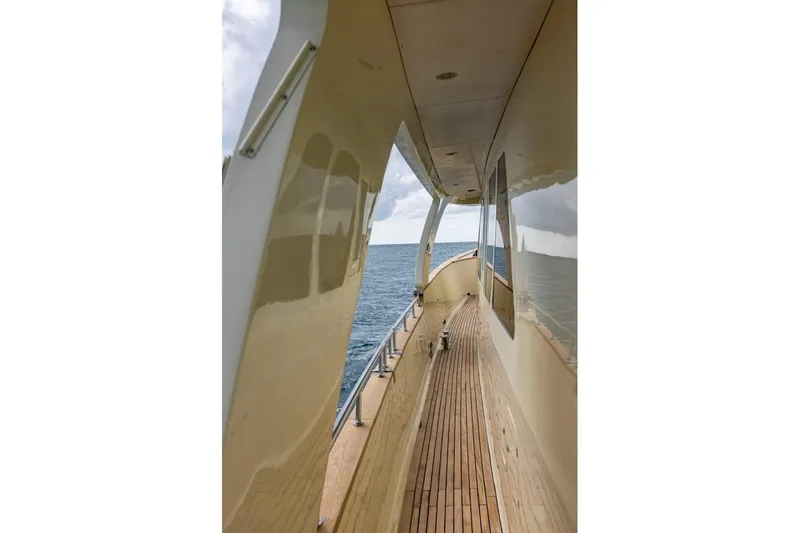 Seabear Yacht Photos Pics Side deck view of 2006 Amanda 72 Explorer yacht on open sea.