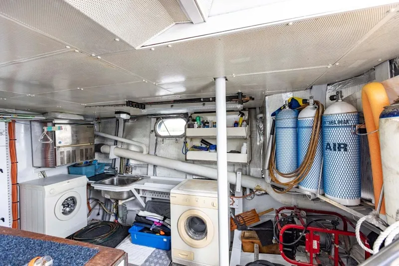 Seabear Yacht Photos Pics Interior of 2006 Amanda 72 Explorer boat with laundry and storage area.