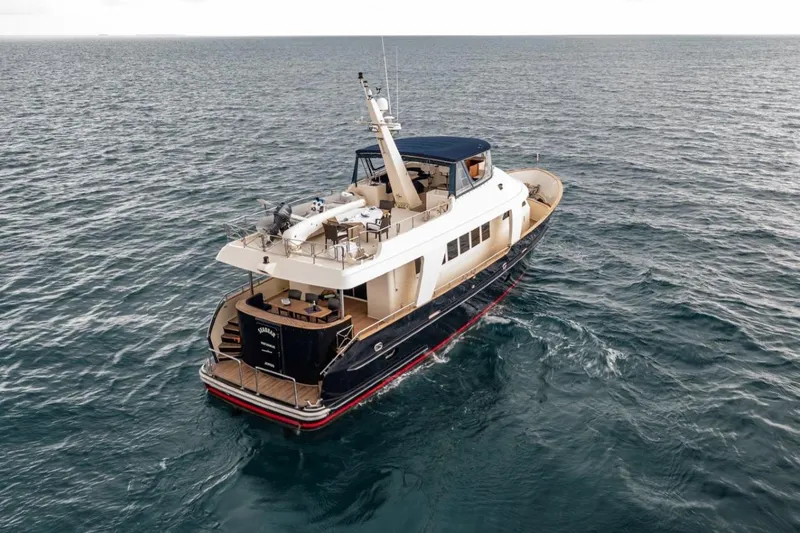 Seabear Yacht Photos Pics Luxury yacht Amanda 72 Explorer, 2006 model, cruising on open sea.