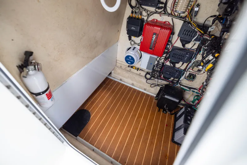 Done Deal Yacht Photos Pics Electrical compartment of a 2014 Yellowfin 32 Offshore boat with wiring and equipment.