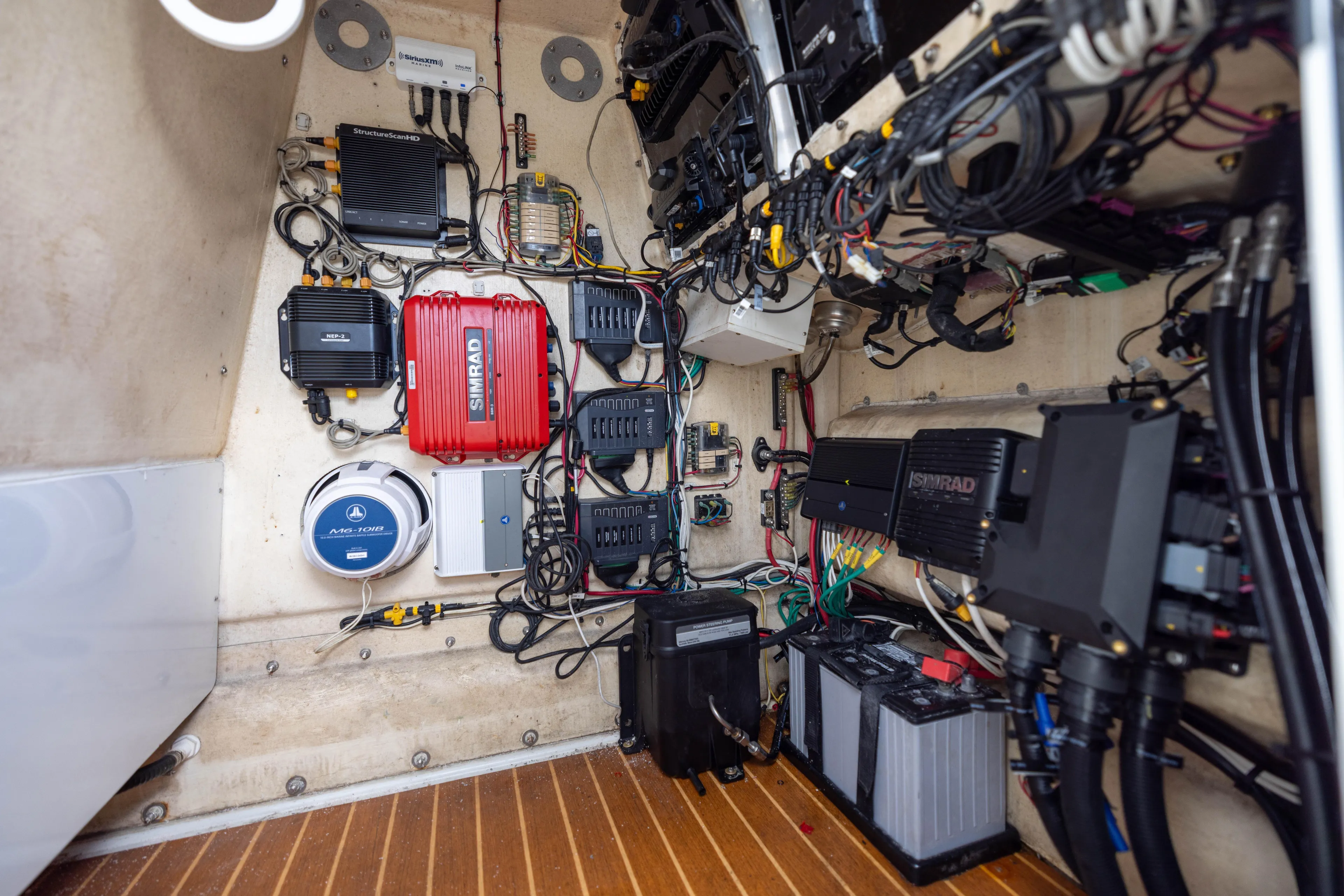 Done Deal Yacht Photos Pics Electrical system inside a 2014 Yellowfin 32 Offshore boat, featuring Simrad equipment.