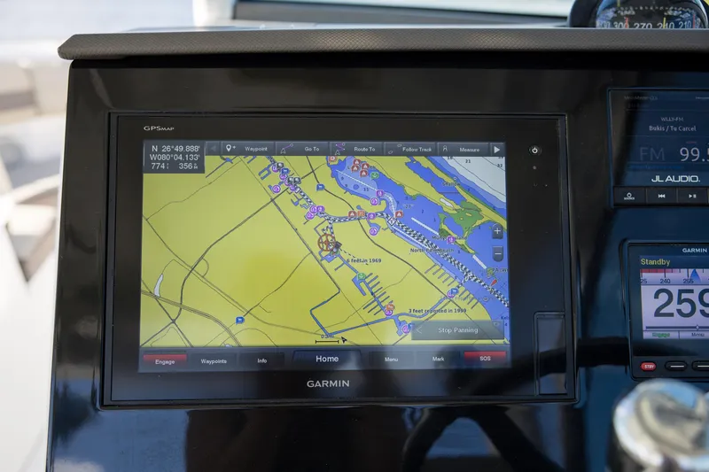 Joysea Yacht Photos Pics Garmin GPS display on 2019 Pursuit DC 325 Dual Console boat dashboard.