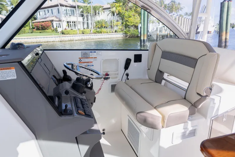 Joysea Yacht Photos Pics 2019 Pursuit DC 325 Dual Console helm with luxurious seating and modern controls.