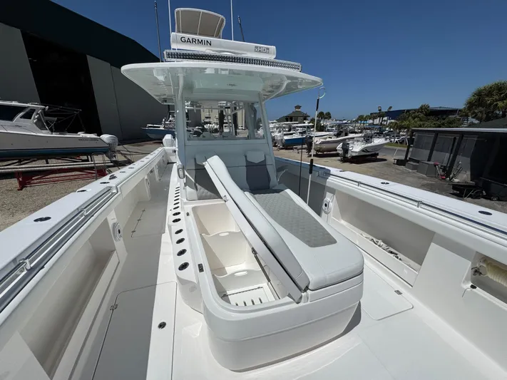  Yacht Photos Pics 2022 Invincible 46 Catamaran with sleek design, spacious deck, and advanced Garmin navigation system.