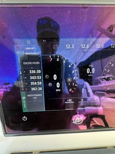 Yacht Photos Pics Dashboard of 2022 Invincible 46 Catamaran showing engine hours and maintenance data.