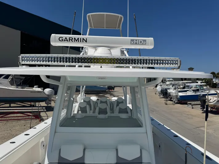  Yacht Photos Pics 2022 Invincible 46 Catamaran with Garmin xHD2 radar, docked in a marina.