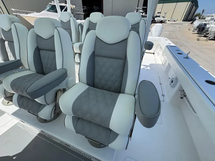  Yacht Photos Pics Luxurious seating on 2022 Invincible 46 Catamaran, featuring plush, ergonomic design.