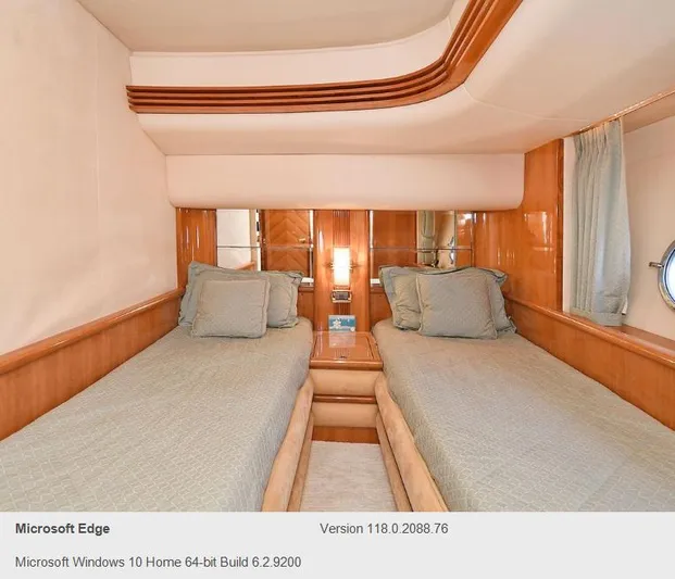  Yacht Photos Pics Twin bed cabin interior of 2005 Azimut 68E yacht with wooden finishes.