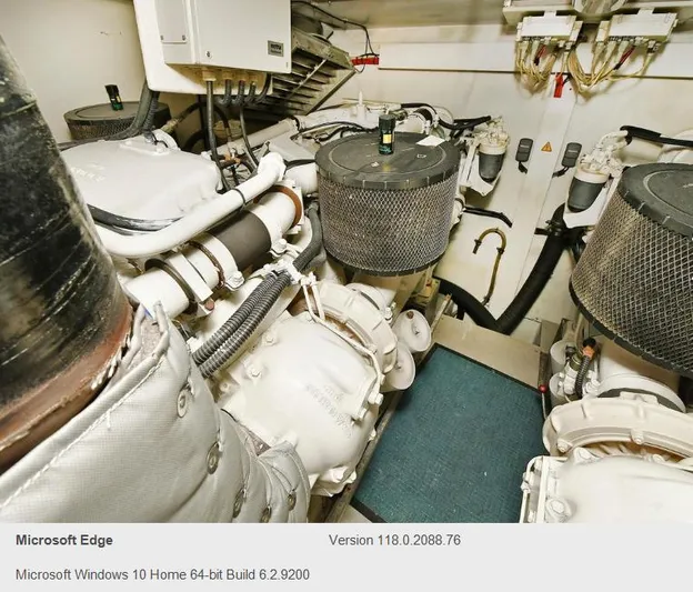  Yacht Photos Pics Engine room of a 2005 Azimut 68E yacht with mechanical components.