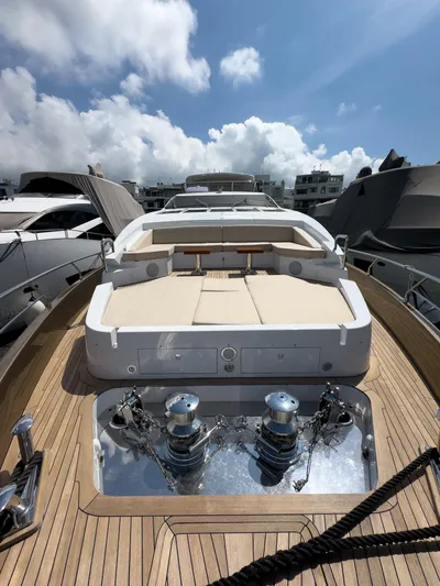  Yacht Photos Pics Azimut 100 Grande 2016 yacht with sun deck and mooring equipment under a blue sky.