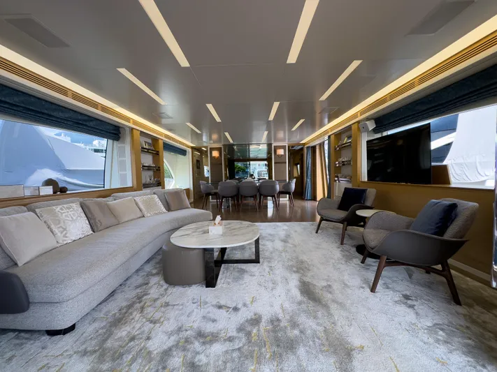  Yacht Photos Pics Luxurious interior of 2016 Azimut 100 Grande yacht with modern furnishings and elegant decor.
