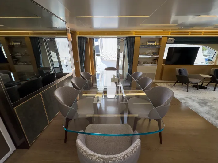  Yacht Photos Pics Luxurious interior of 2016 Azimut 100 Grande yacht with elegant dining area and modern decor.