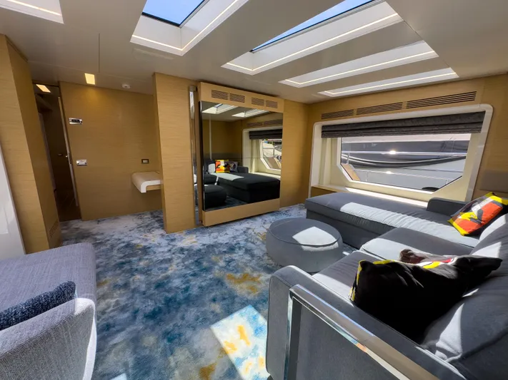  Yacht Photos Pics Luxurious interior of 2016 Azimut 100 Grande yacht with modern furnishings and skylights.