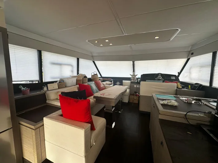  Yacht Photos Pics Luxurious interior of 2022 Fountaine Pajot MY5 yacht with modern furnishings and decor.
